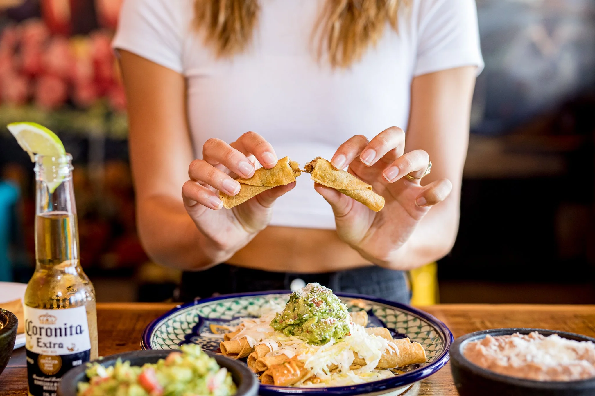 Fresh handmade taquitos and Mexican sides at El Tianguis