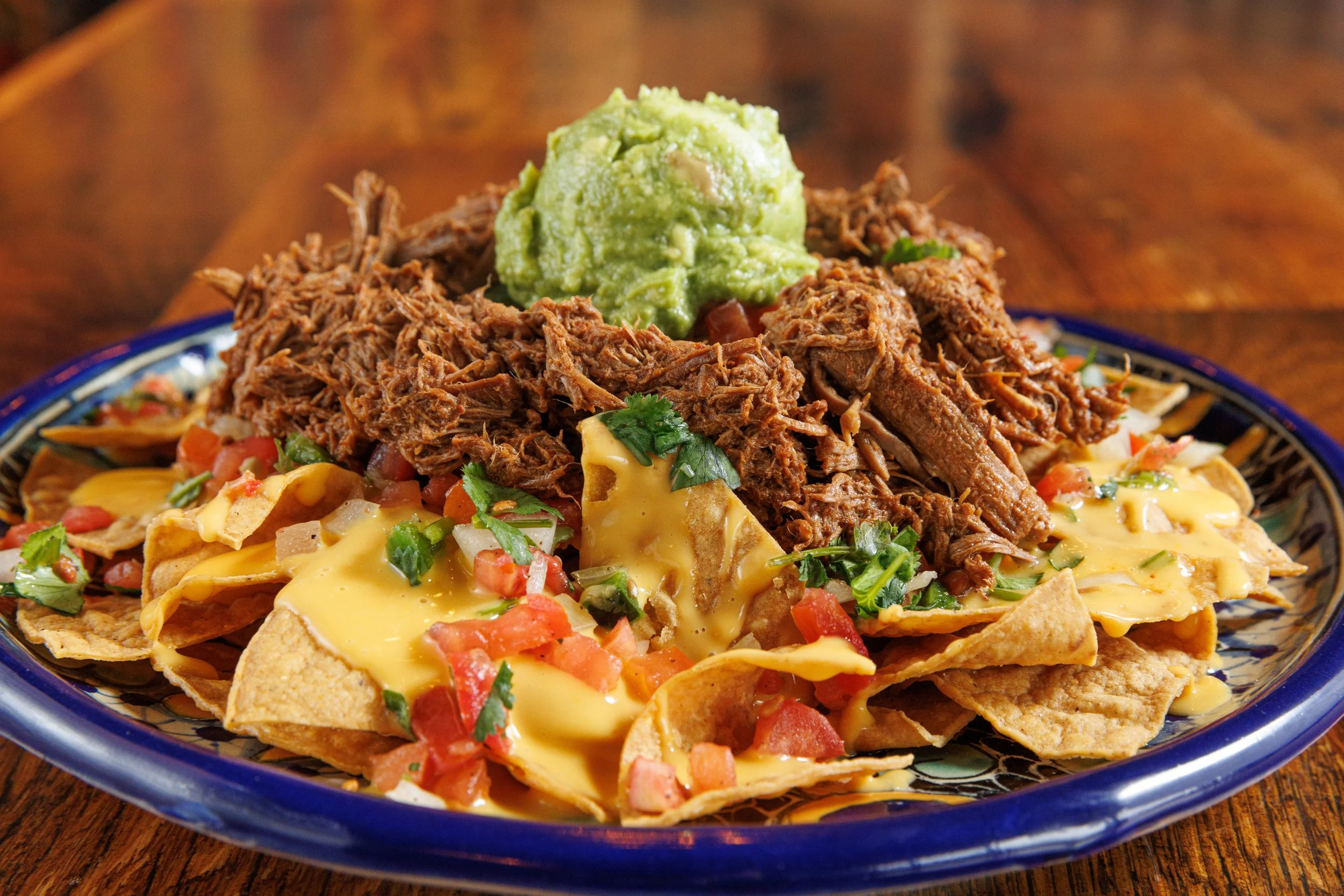 Loaded nachos and rolled tacos at El Tianguis